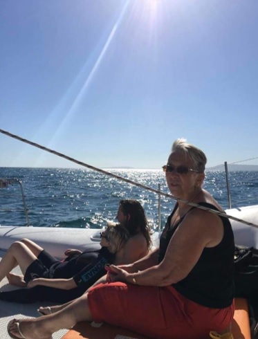 Jenny on a boa trip whilst visiting her son in Australia